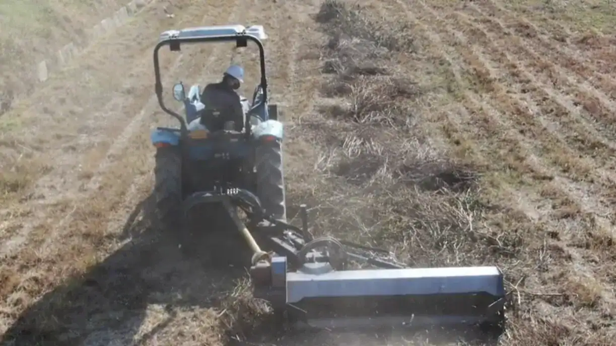 Tractor mounted mulchers for orchard and residue management.