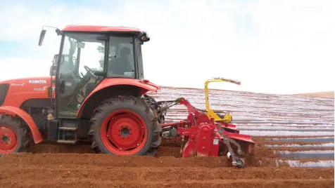 Side profile of tractor with ORATEXCA BG-2000 mulcher attached
