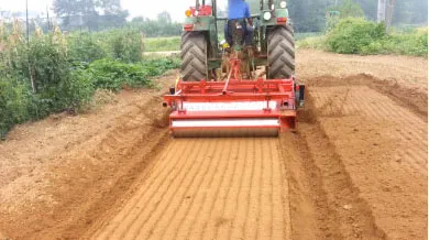 Tractor pulling ORATEXCA GK7 BG-1800SM with heavy duty roller