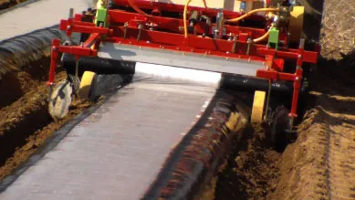 ORATEXCA GK7 BG-900 series laying plastic mulch tightly over wide potato beds