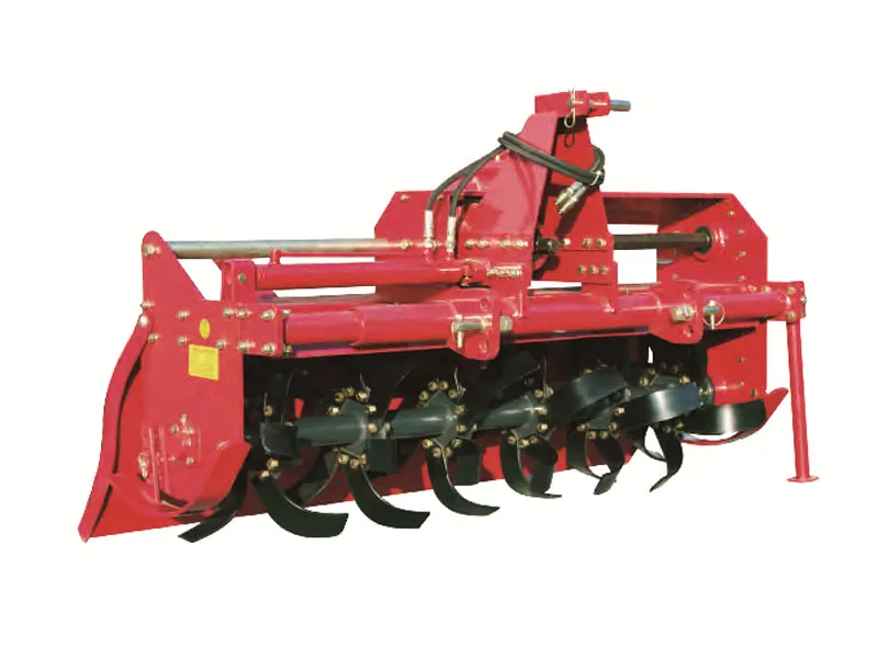 Detailed view of the flange-type tiller shaft and top-mounted hydraulic side-shift cylinder